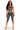 A woman modeling a matching two-piece activewear set in a washed charcoal gray color. The set includes a strappy cutout crop top and high-waisted cropped leggings with vertical seam detailing, shown against a plain white background.