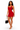 A woman modeling a bright red bodycon mini dress with a square neckline, holding a black handbag and wearing clear high-heeled sandals against a plain white background.