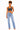 A woman modeling a pair of high-waisted, light-wash blue straight-leg jeans with a dark gray crop top, standing against a plain white background.
