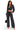 A woman modeling a dark gray acid-wash two-piece set consisting of a cropped zip-up hoodie and matching wide-leg drawstring pants, paired with clear high-heeled sandals and a small black handbag, against a plain white background.