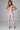 Excited.....Deep V Cut Ruched Jumpsuit | Swagg Boutique LLC.