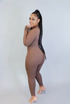 Spin The Block.....Long Sleeve Lucky Label Thumb Hole Jumpsuit | Swagg Boutique LLC.